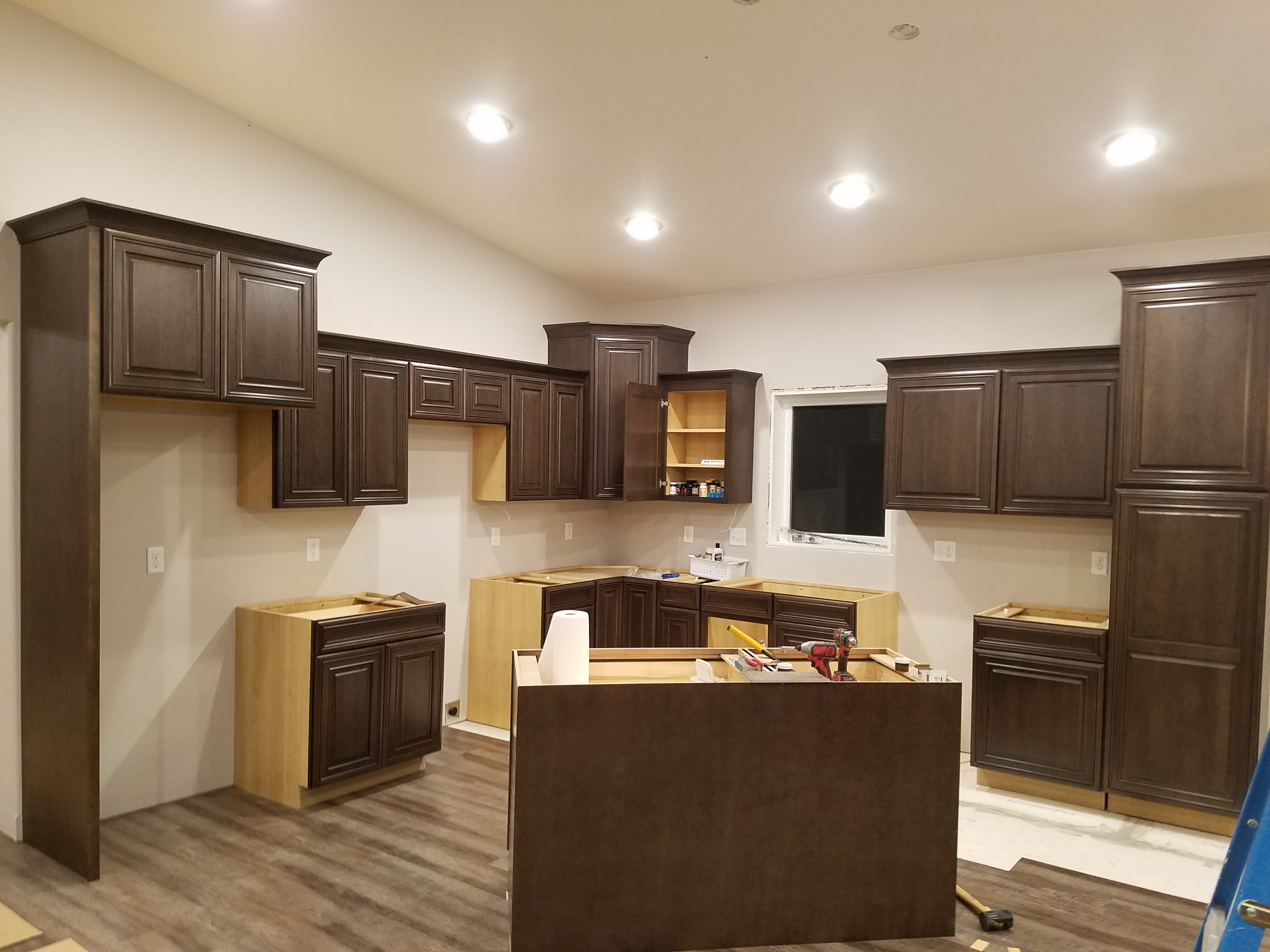 Tad Schmidt Builders' cabinet installation process is prompt, precise, and dependable.a prompt manner.